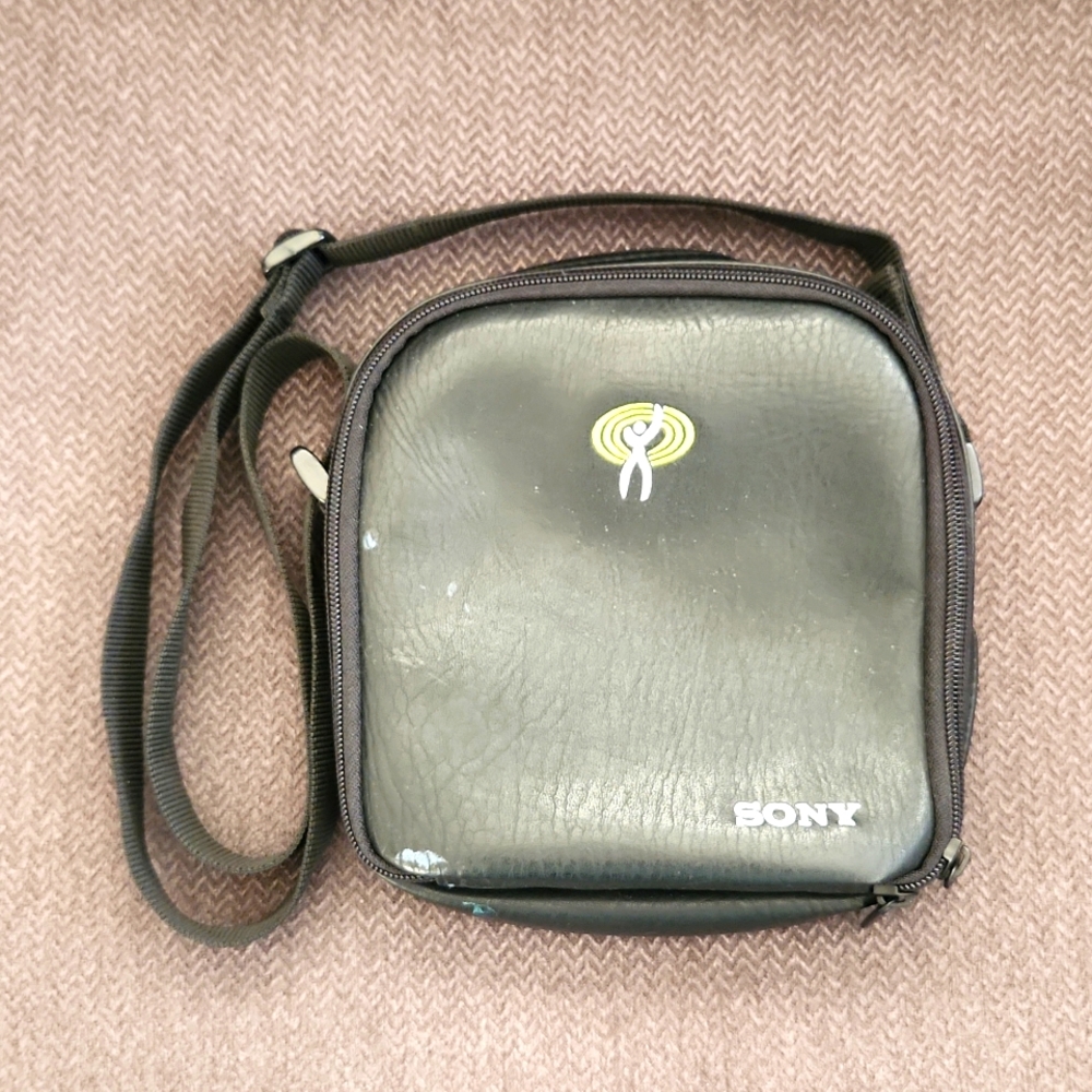 Vintage Sony Black leather zip-up Discman carrying case and CD/DVD holder. OS.